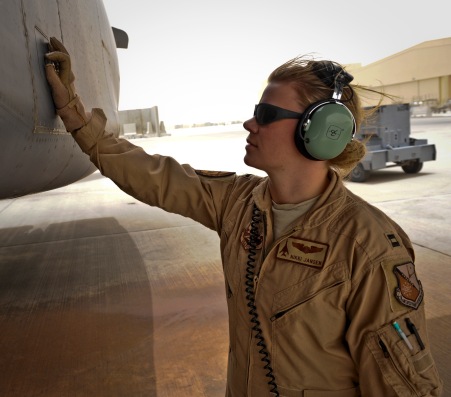 Capt. Nikki Jansen performs pre-flight checks of a B-1B Lancer June 11, 2013, at the 379th Air Expeditionary Wing in Southwest Asia. Packard is a 34th Expeditionary Bomb Squadron pilot deployed from Ellsworth Air Force Base, S.D. (U.S. Air Force photo/Senior Airman Benjamin Stratton)